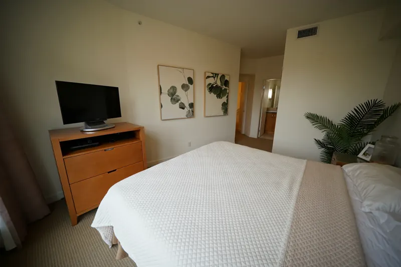 Primary bedroom in a Strand condo