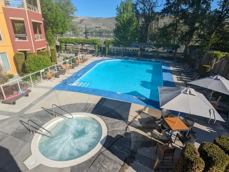 Pool and hot tub from above, with Okanagan Lake views